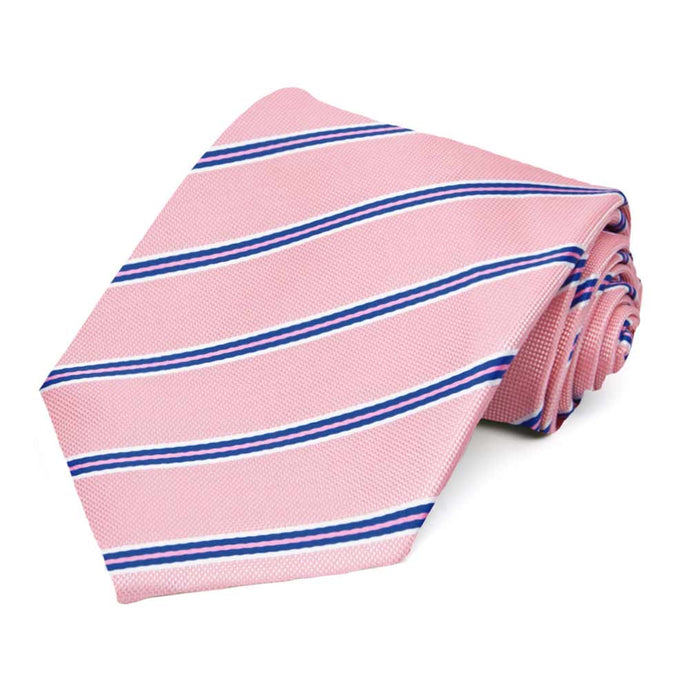 An extra long necktie in pink, blue and white pencil stripes, rolled to show texture of fabric