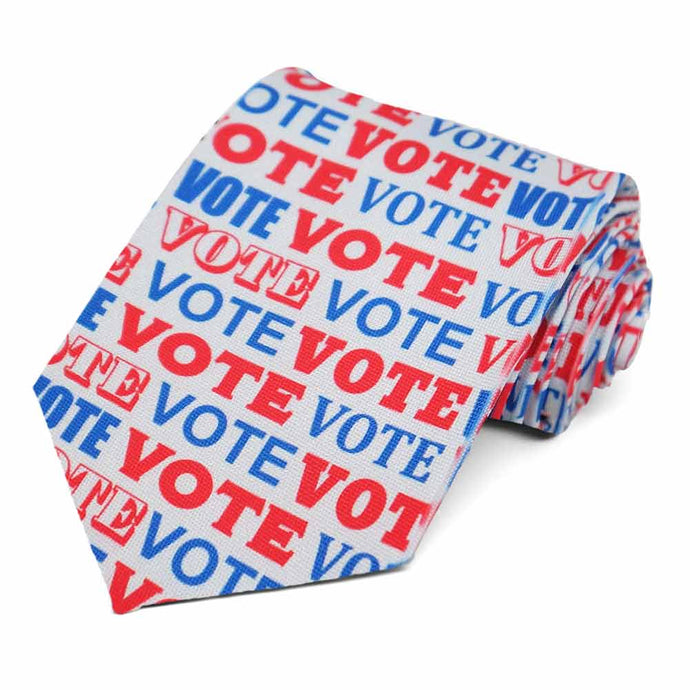 Vote written in red and white on a light gray necktie.
