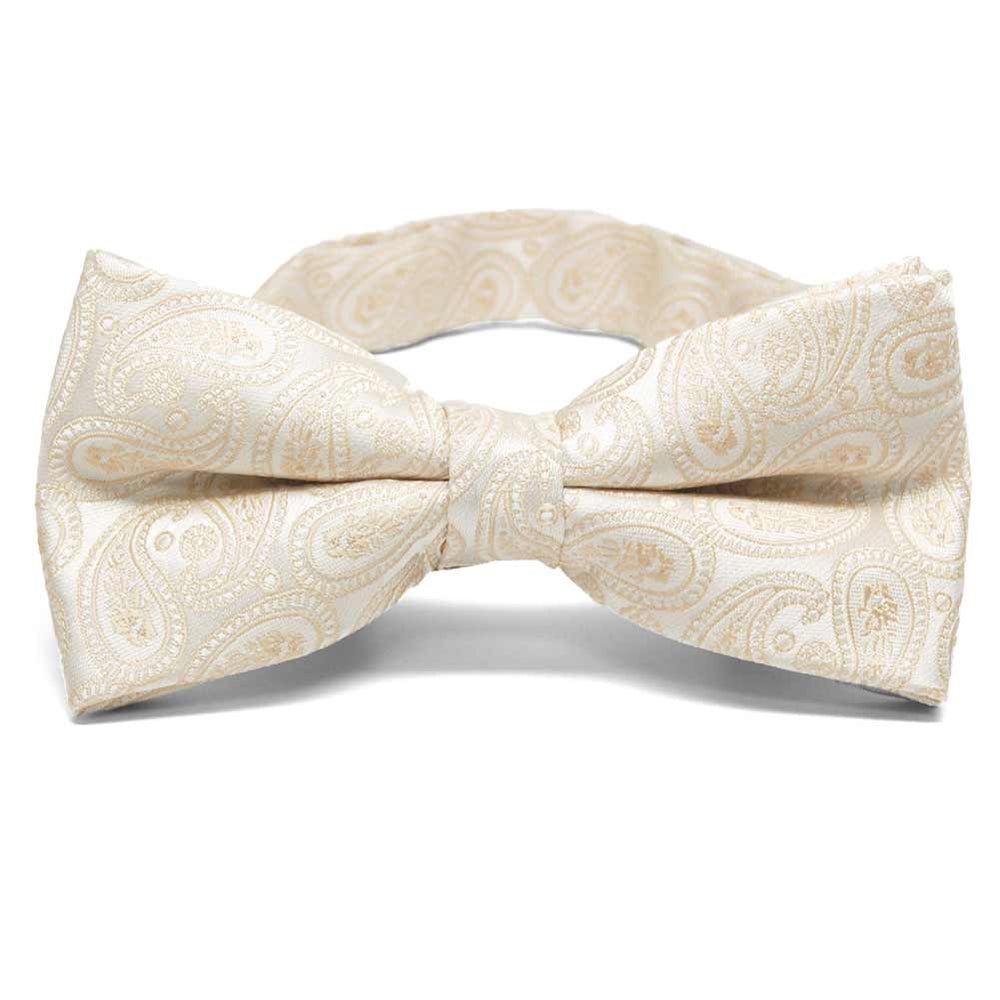 Off-white paisley bow tie, close up front view to show pattern