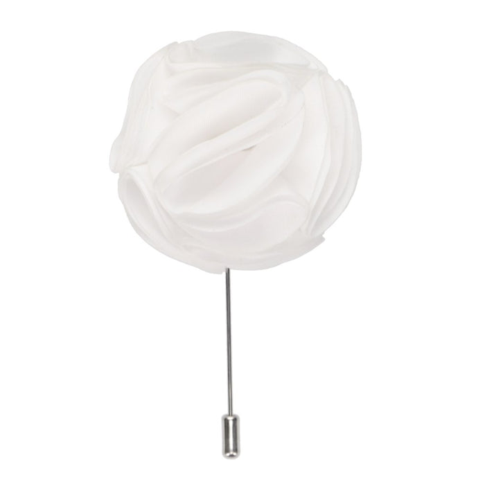 A white flower lapel pin with a silver pin stick