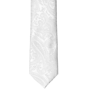 The front tip of a white paisley slim tie