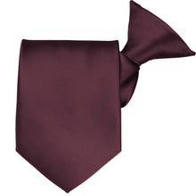 Load image into Gallery viewer, A rolled wine colored clip-on tie