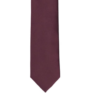 Front view of a solid color wine tie in a slim width