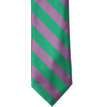 Load image into Gallery viewer, The front of a wisteria and kelly green striped tie, laid out flat