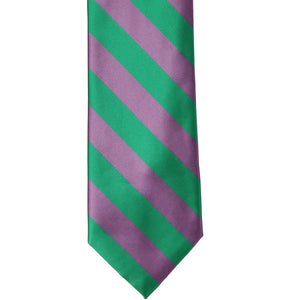 The front of a wisteria and kelly green striped tie, laid out flat