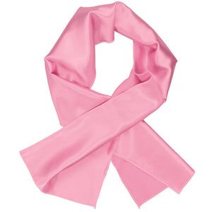 A women's bright pink scarf, crossed over itself