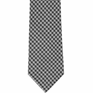 The front of a black and white houndstooth extra long tie in a textured fabric