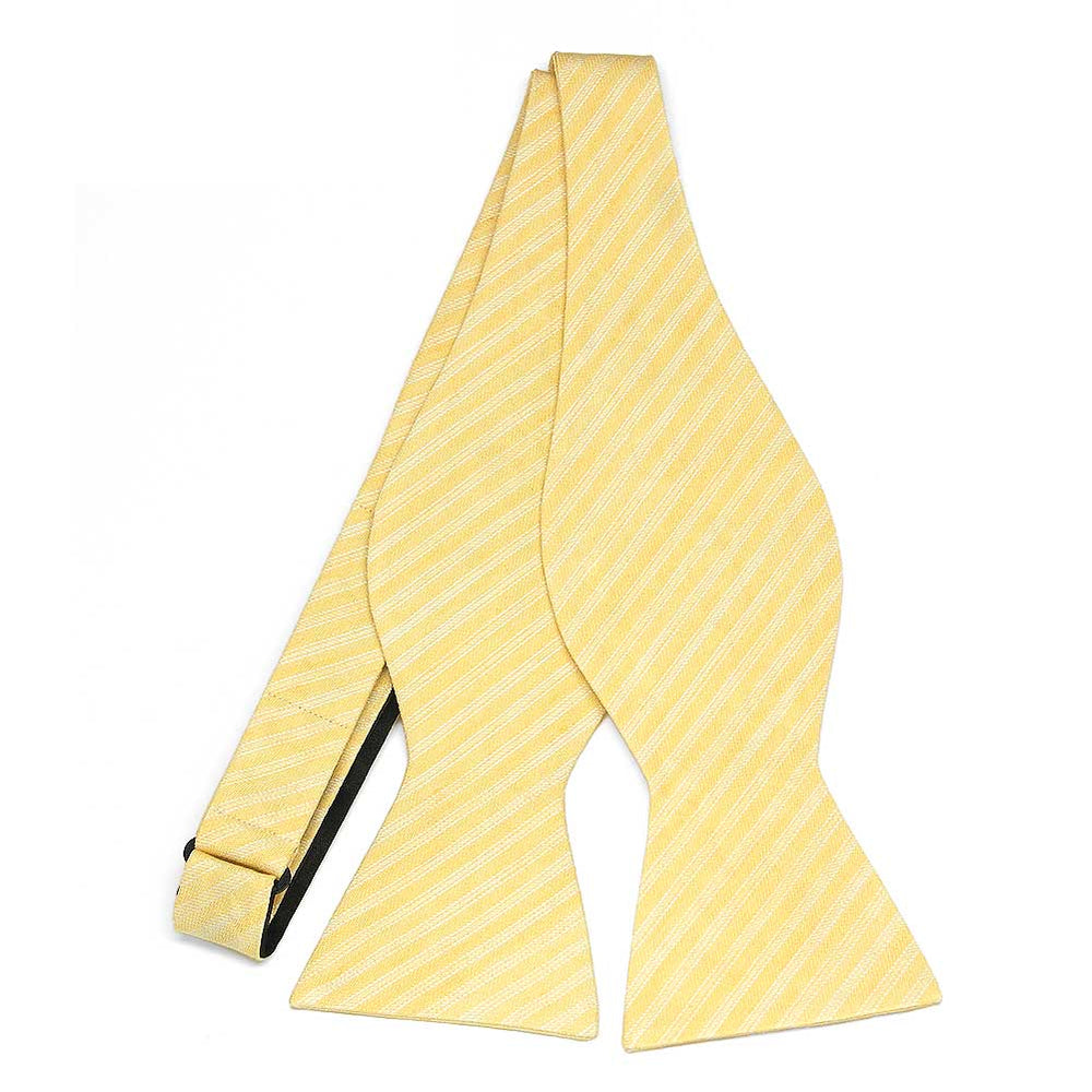 An untied yellow and white striped self-tie bow tie