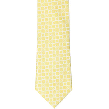 Load image into Gallery viewer, Front view of a yellow trellis pattern necktie